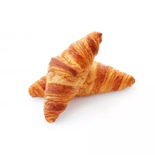 Golden buttery croissants stacked together