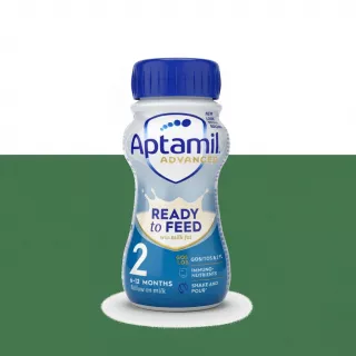 Aptamil Advanced Ready to Feed Stage 2 infant formula bottle held in hand