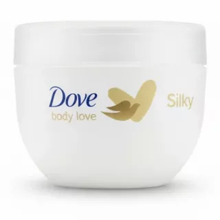 Side view of Dove Body Love Silky body cream tub held in hand