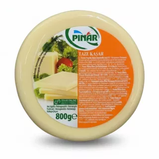 Top label view of Pinar Taze Kaşar cheese wrapped in plastic