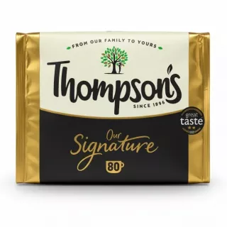 Thompson's Signature Black Tea gold and black foil pack with logo