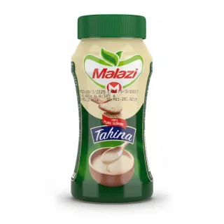 Malazi Tahina jar with green lid and label featuring sesame seeds and tahini dip