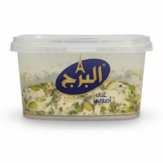 Side view of Alburj Pistachio Halva tub highlighting packaging design and pistachio pieces
