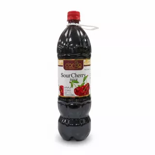 Bottle of Donya sour cherry juice with red cap and cherry graphics on label