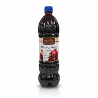 Full bottle of Donya Pomegranate Juice with label showing fruit images