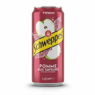 Schweppes apple flavoured soft drink can held in hand