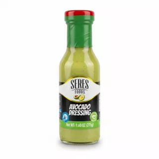 Bottle of Seres Foods avocado dressing with green and red cap enlarged image on a white background