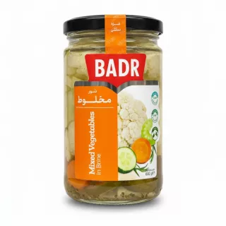 Jar of Badr mixed vegetables in brine with visible cauliflower, cucumber, carrot