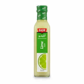 Bottle of Badr Lime Juice with green label and lime slice image