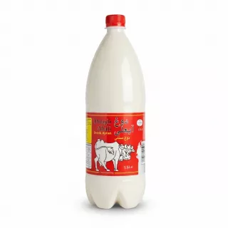 1.5L bottle of Abali Dough sparkling ayran drink with red label and cow illustration
