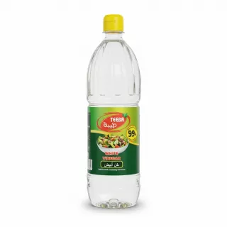 Teeba brand white vinegar bottle with yellow cap and green label showing salad image