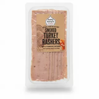 Packaged slices of Aunty Noray's smoked turkey rashers in transparent plastic