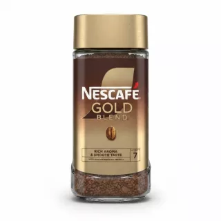 Glass jar of Nescafé Gold Blend instant coffee with gold and brown label