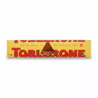 Toblerone chocolate bar packaging showing triangular chocolate piece illustration