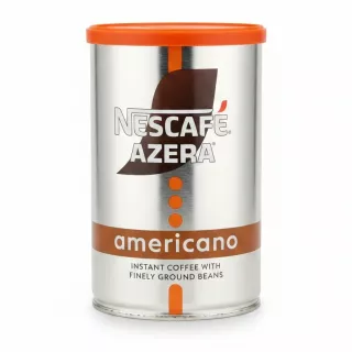 NESCAFÉ Azera Americano instant coffee tin with orange lid