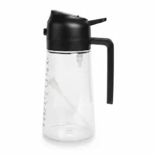 Transparent syrup dispenser bottle with black lid and handle
