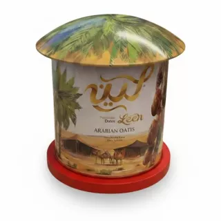 Leen Premium Dates Arabian Oasis with palm tree canopy lid and desert scene