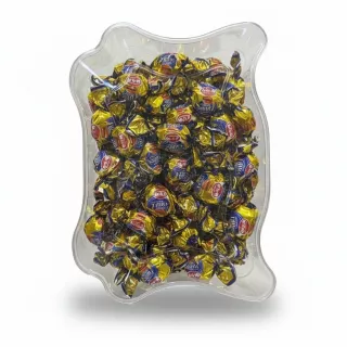 Clear container with individually wrapped Nidan Toffees filled with chocolate