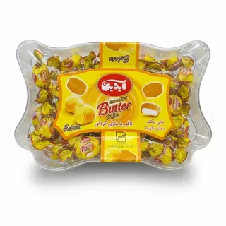 Clear plastic box of yellow-wrapped Aidin Butter Cream Filled Toffees