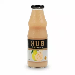 Glass bottle of The HUB Guava Nectar showing front label