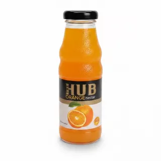Bottle of The Hub Orange Nectar on wooden table