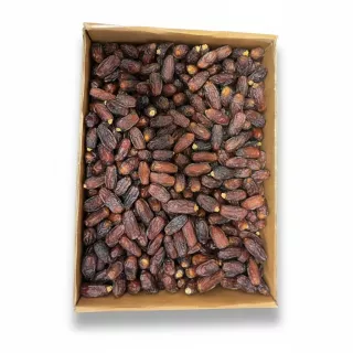 Box filled with plump, dark brown Aliat Taibah premium dates