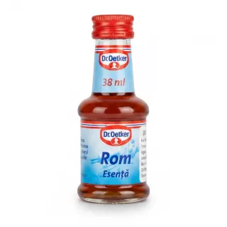 Small glass bottle of Dr. Oetker rum essence with red cap