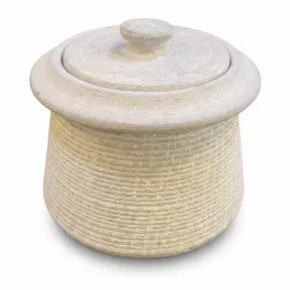 Traditional textured clay storage jar with lid