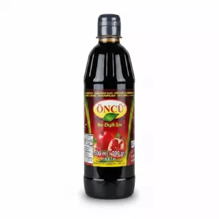 Bottle of Öncü Pomegranate Sauce front label showing pomegranate images