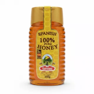 Garusana Spanish 100% pure honey in a golden squeeze bottle