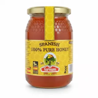 Jar of Garusana Spanish 100% Pure Honey with yellow label and gold lid