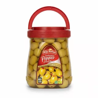 Jar of Köy Sefası green olives stuffed with red pepper
