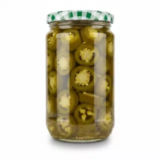 Jar of sliced green jalapeño peppers