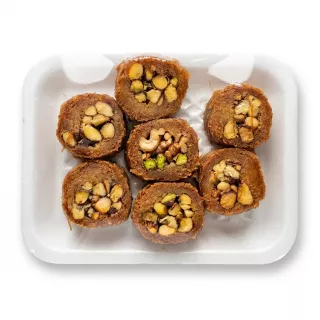 Enhanced Tray of Rayan assorted baklava rolls with visible nut filling