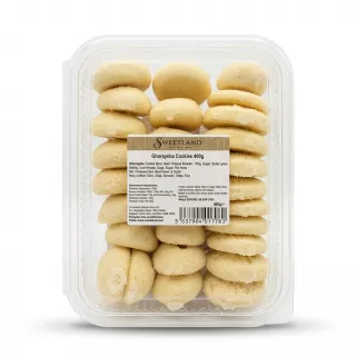 A professional e-commerce photo of a clear plastic container filled with Sweetland Ghorayeba Cookies Classic, 400g. The container is centered against a clean white background, showing the stacked, pale yellow cookies. The main product label is visible and clear, while all other tags and stickers have been removed. PRODUCT TITLE: Sweetland Ghorayeba Cookies Classic PRODUCT: Sweetland Ghorayeba Cookies 400g clear pack with label