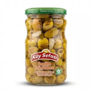 Enhanced Front view of Köy Sefası Grilled Green Olives jar 660g in hand