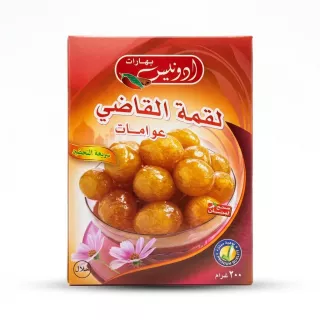 Enhanced Front of Adonis Spices Loukoumades dumpling mix box with sweet dumplings displayed