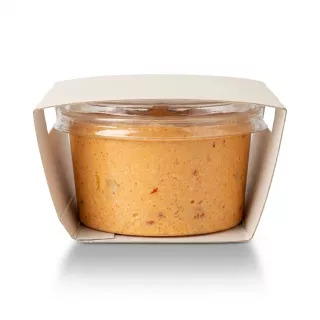 Enhanced Side view of opened Paltsidis Greek Feta & Red Pepper Dip 200g tub