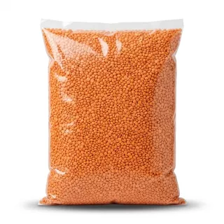 Enhanced Large clear plastic bag of red split lentils, 5kg, on a shelf