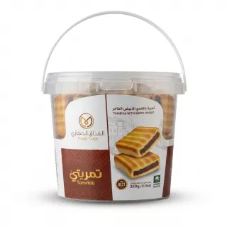 Enhanced Hijazi Taste Tamriya With White Wheat front packaging showcasing date pastries