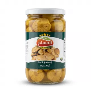Enhanced Front of Al Hussam Garlic Ajem Pickle jar showing label and garlic slices
