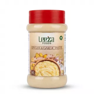 A 1000g jar of Leeza Foods Ginger & Garlic Paste with a red lid, featuring a detailed label showing the paste and fresh ingredients, isolated against a plain white background with professional lighting.
