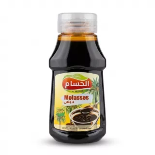A 410g glass bottle of Al Hussam 100% Natural Molasses (Dibs) with a white plastic cap, featuring a detailed label showing a spoon of molasses over a bowl and date palm illustrations, presented on a plain white studio background with a soft, symmetrical shadow. PRODUCT TITLE: Al Hussam 100% Natural Molasses PRODUCT: Front view of Al Hussam Molasses bottle with clear label PREFERENCES: - Aspect ratio: 1:1