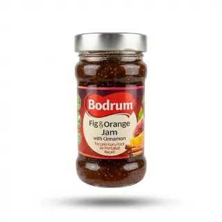 Enhanced Enhanced Hand holding a jar of Bodrum Fig & Orange Jam with Cinnamon