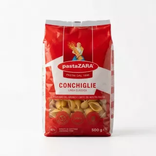 A 500g bag of Pasta Zara Conchiglie Classic pasta is shown in a close-up against a pure white background.