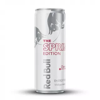 A professional studio photograph of a Red Bull Spring Edition Cherry Sakura energy drink can, featuring a white and silver design with a soft shadow on a white background.