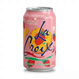 Enhanced Hand holding La Croix Strawberry Peach Sparkling Water can in a shop