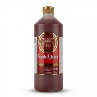 A 1:1 professional e-commerce product photograph of a 1 Litre bottle of Heera Tomato Ketchup, isolated on a clean white background. The bottle is centered, features its rich red sauce and distinct gold cap, with the front label text, including the Heera logo and size information, perfectly clean and in sharp focus. PRODUCT TITLE: Heera Tomato Ketchup 1L [Detailed Image of Heera Tomato Ketchup 1L bottle on a clean white background]