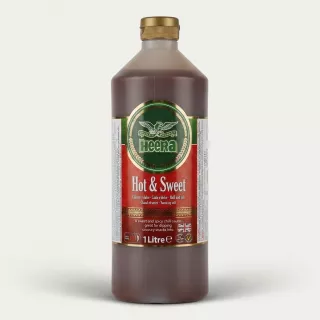 A 1-liter bottle of Heera Hot & Sweet Chilli Sauce is presented in a sharp, professional e-commerce product photo, centered with a clean background. The prominent front label details the product as Hot & Sweet Chilli Sauce in multiple languages and displays the Halal logo and Union Jack.