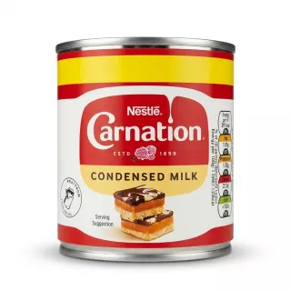 Enhanced Front view of Nestlé Carnation Condensed Milk 397g tin